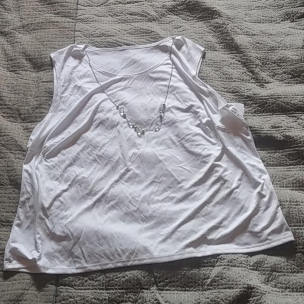 White sleeveless blouse size 1X.